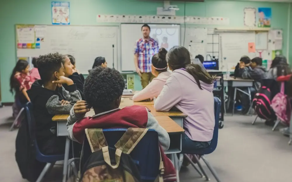 Students learning in a classroom — illustrative photo